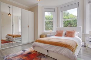 Bedroom One- click for photo gallery